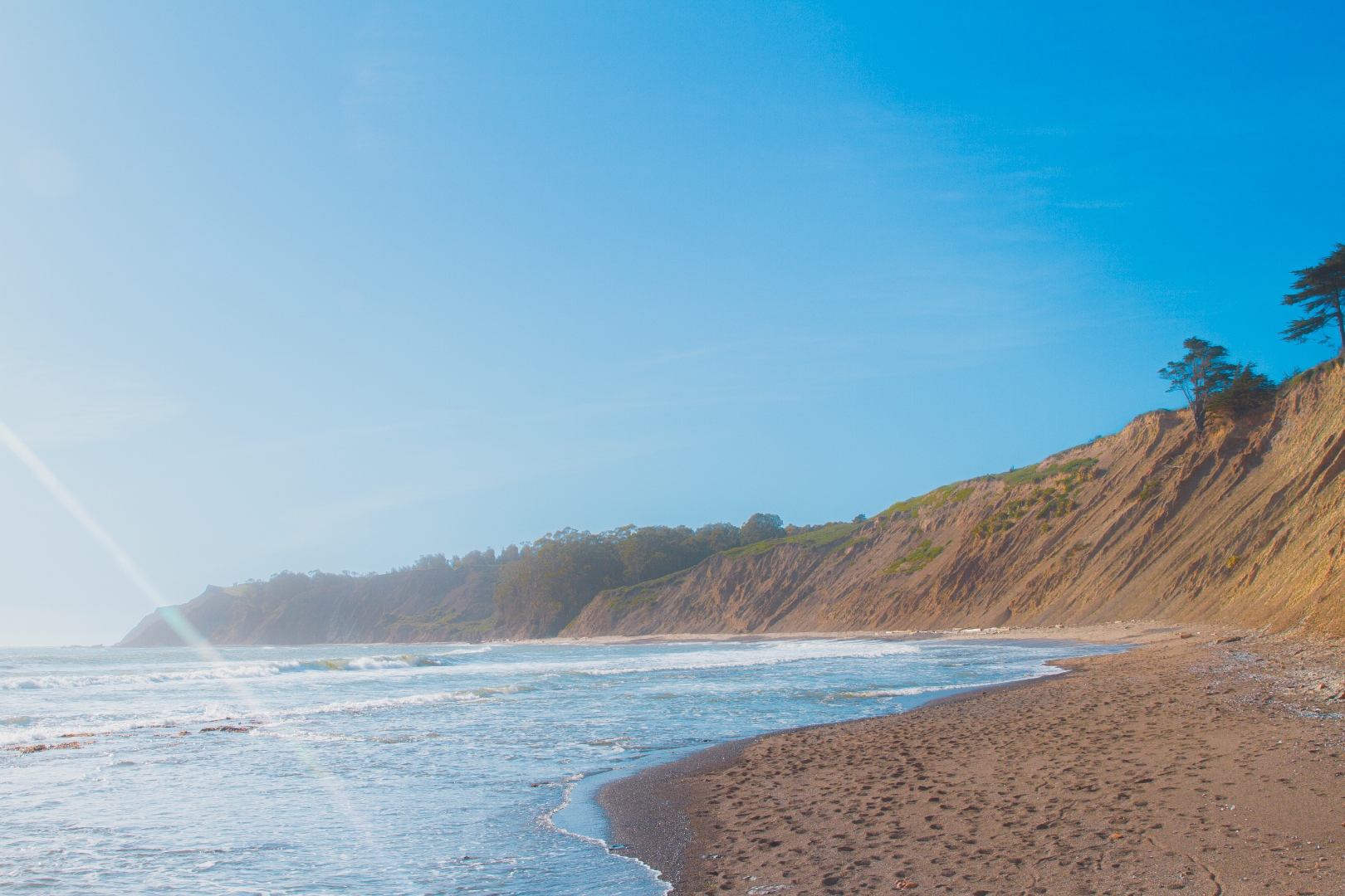 Northern California coastal bluffs and beach at golden hour