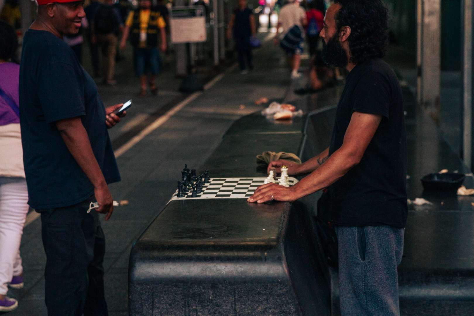 Street chess game at night in New York City