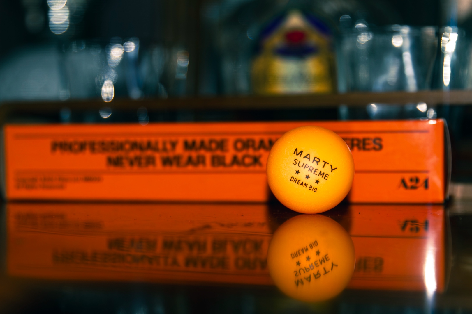 Marty Supreme ping pong ball close-up with shallow depth of field